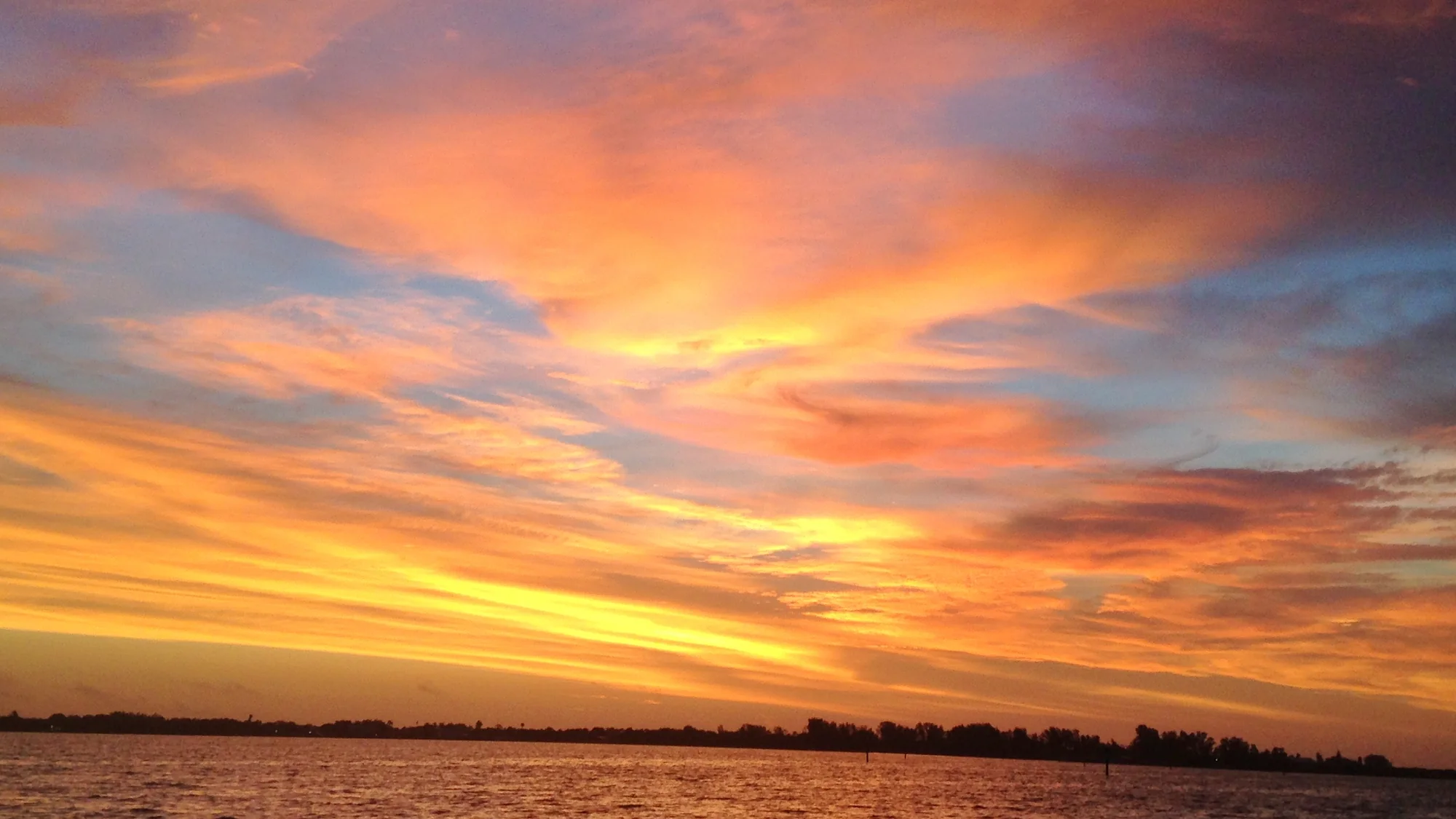 Sunrise over Placida Harbor, next to Rotonda West